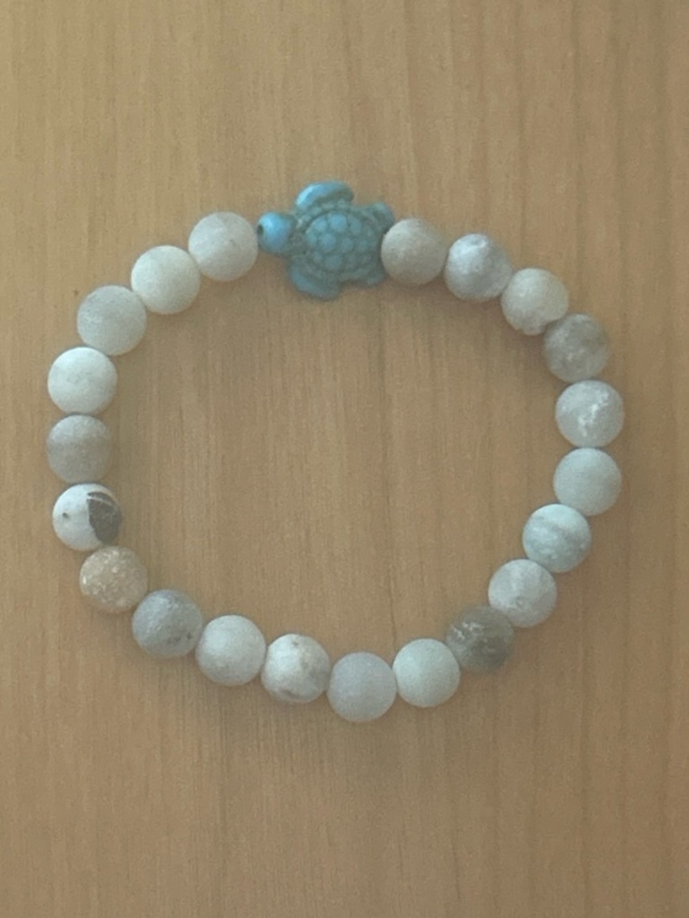 White and gray stone beads bracelet with turquoise turtle charm
